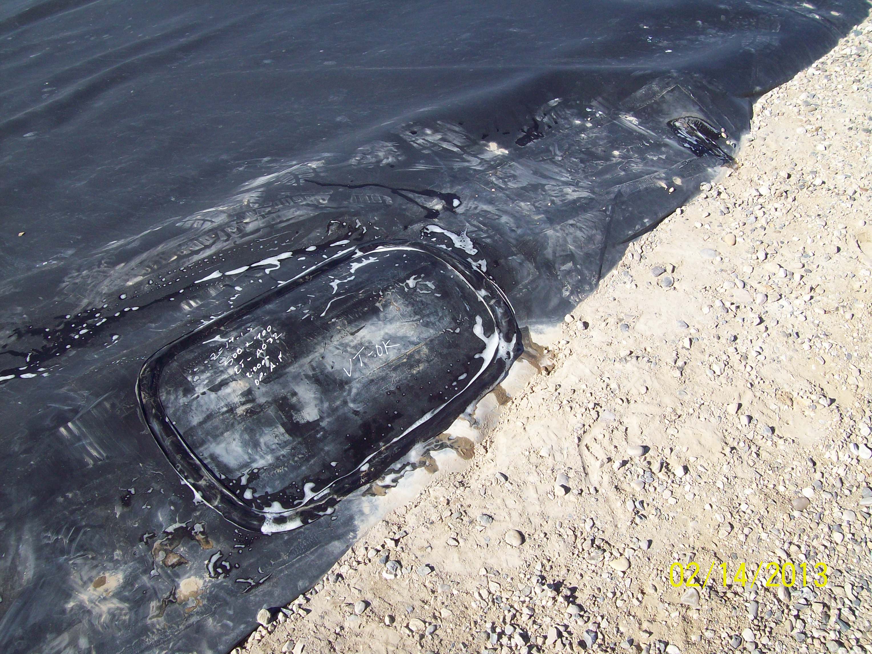 10melba_wwtp_pond_repair_2-14-13