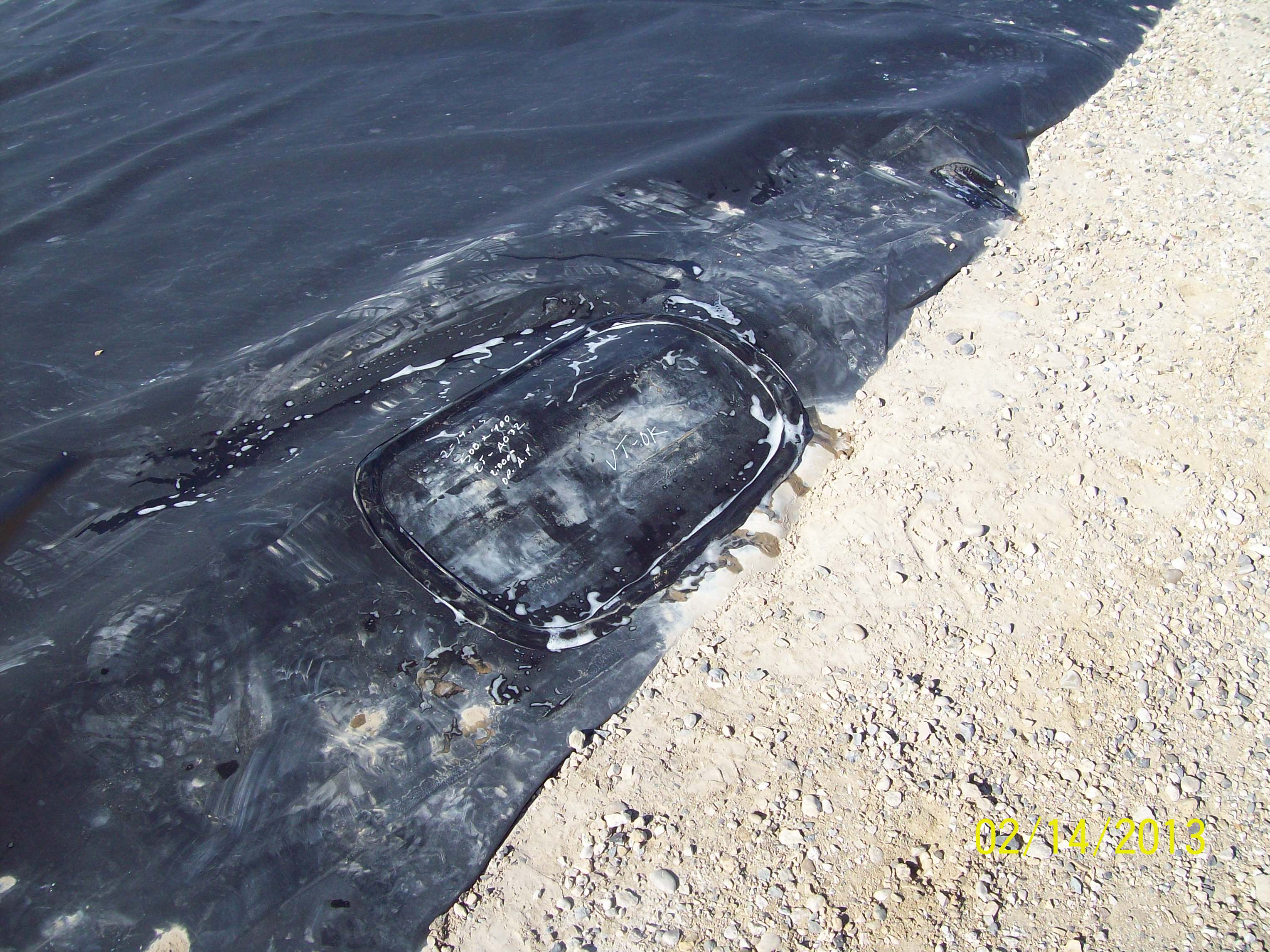 11melba_wwtp_pond_repair_2-14-13