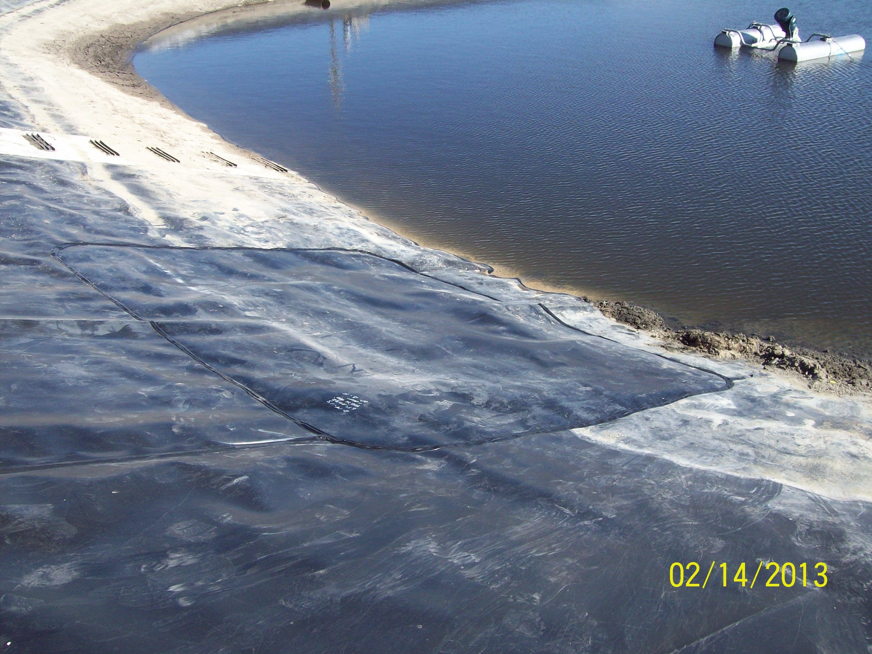 2melba_wwtp_pond_repair_2-14-13