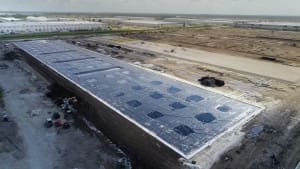 Comanco restoring land with an HDPE Vapor Barrier