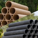 HDPE and cardboard sod tubes side by side